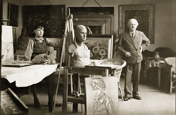 Peter August Böckstiegel in seinem Dresdner Atelier mit seinem Sohn Vincent
