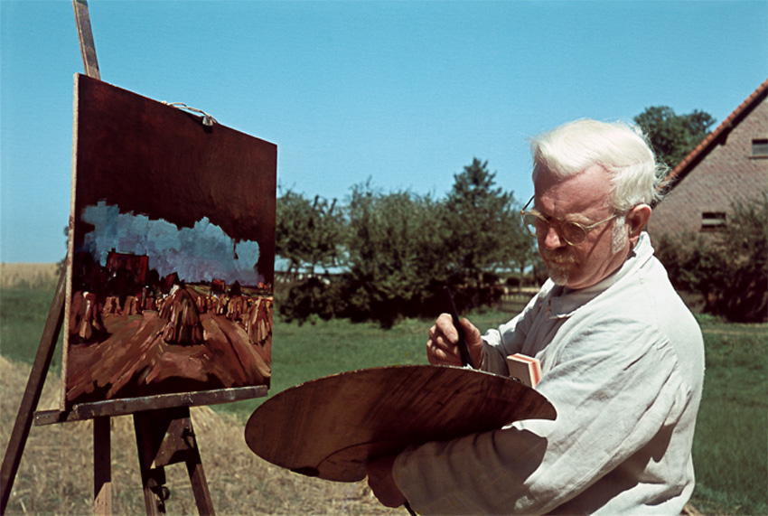 Peter August Böckstiegel in Arrode bei der Arbeit am Gemälde Erntefeld